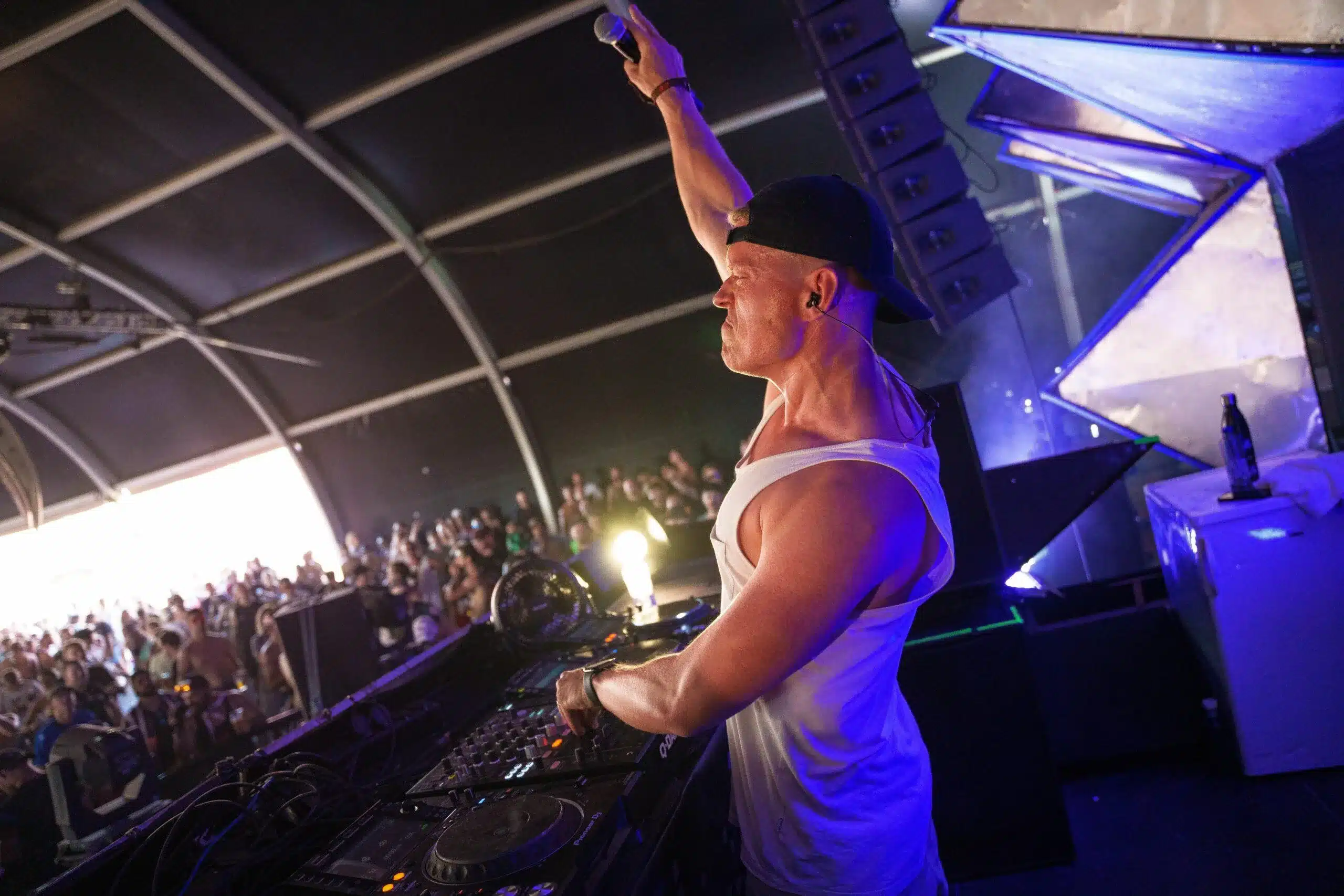 Steven Tel performing for a hard dance crowd