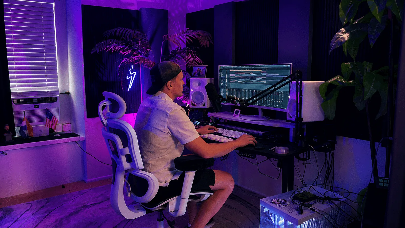 NEROZ producing hard dance music in his studio